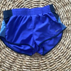 Royal blue Nike running shorts